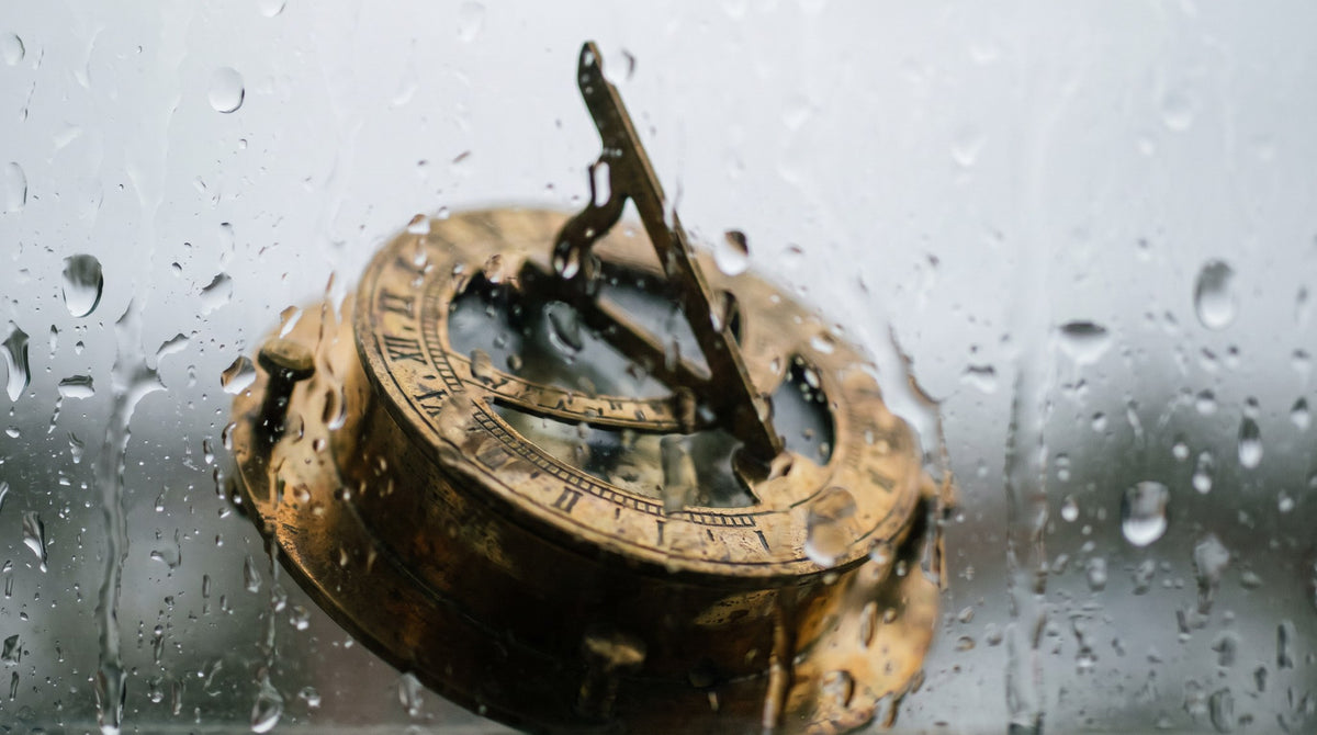 Antique Brass Sundial in Rain Art Print