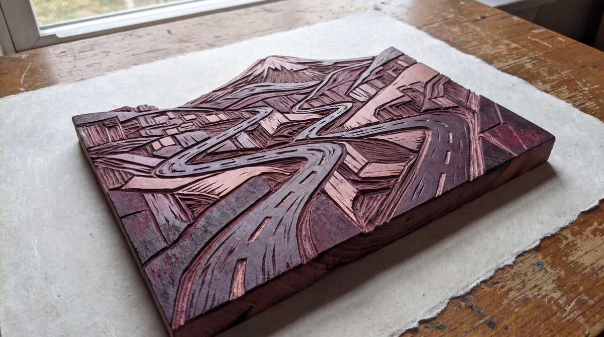Winding Mountain Pass Relief Woodcut Art