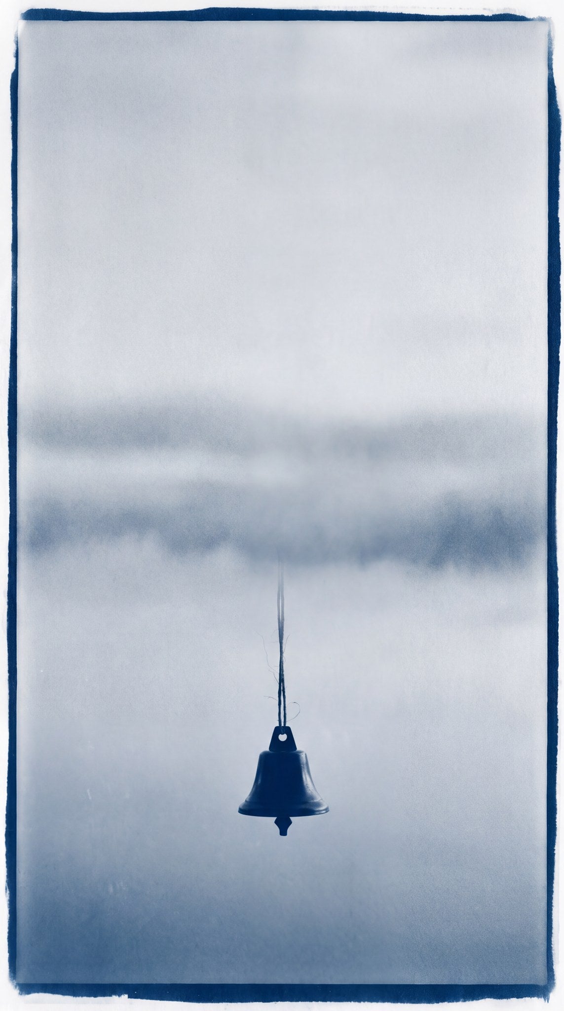 Solitary Bell in Cyan Mist