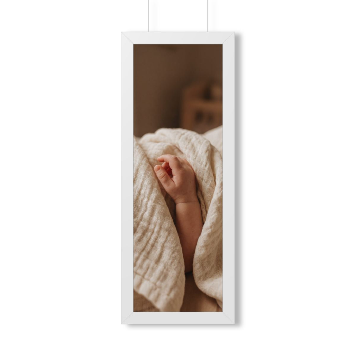 Framed Vertical Poster - Tender Newborn Hand in Soft Muslin...