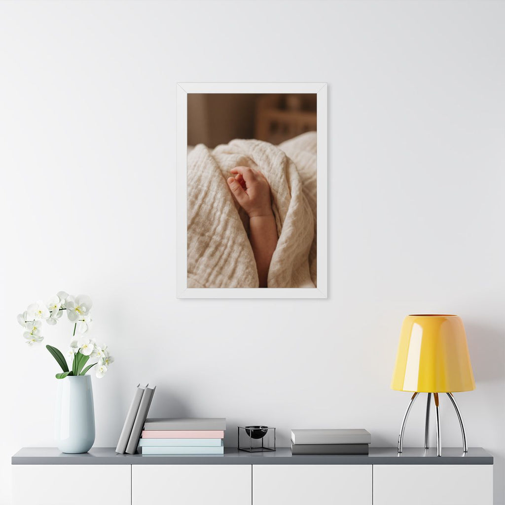Framed Vertical Poster - Tender Newborn Hand in Soft Muslin...