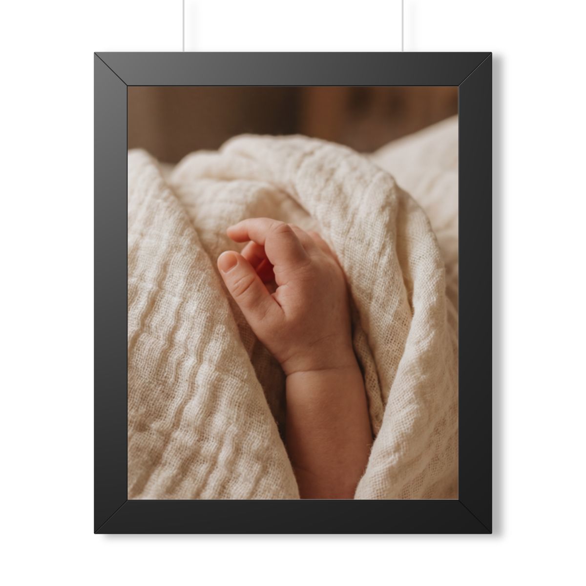 Framed Vertical Poster - Tender Newborn Hand in Soft Muslin...
