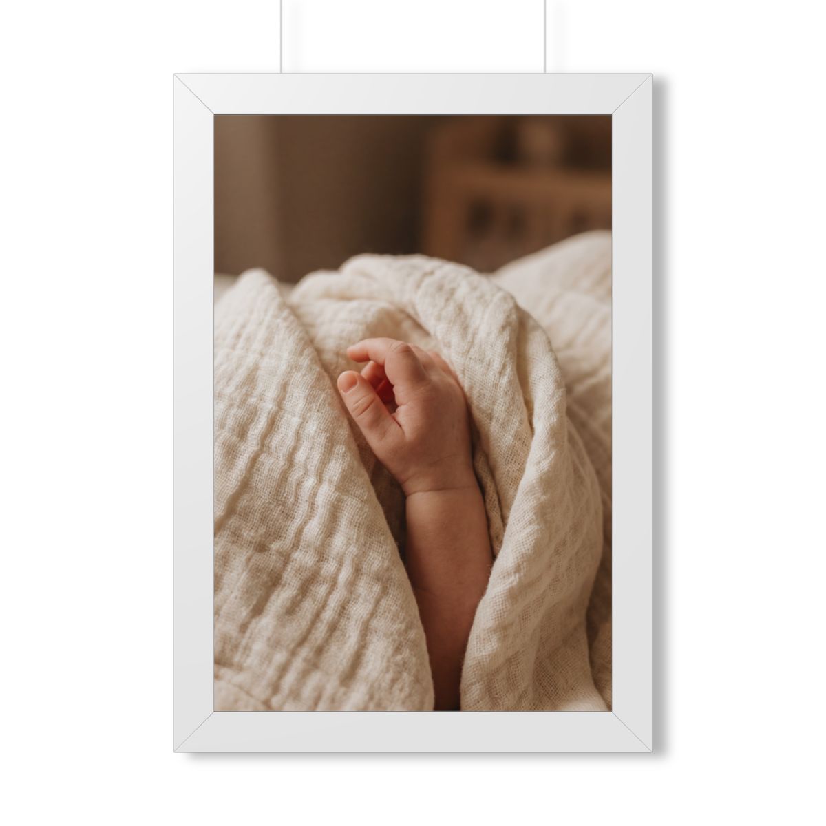 Framed Vertical Poster - Tender Newborn Hand in Soft Muslin...