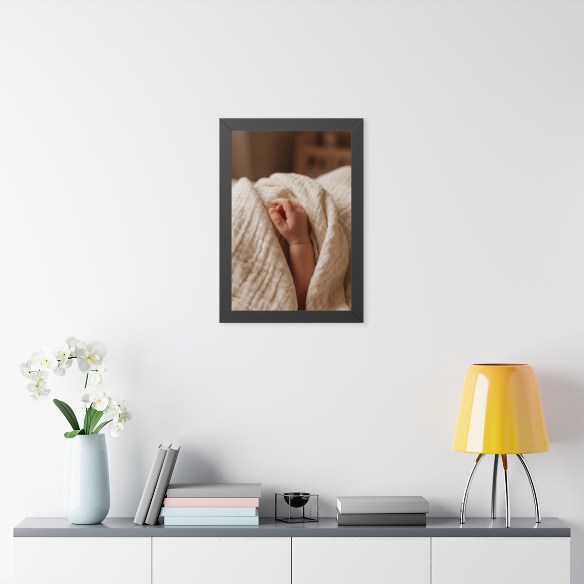 Framed Vertical Poster - Tender Newborn Hand in Soft Muslin...