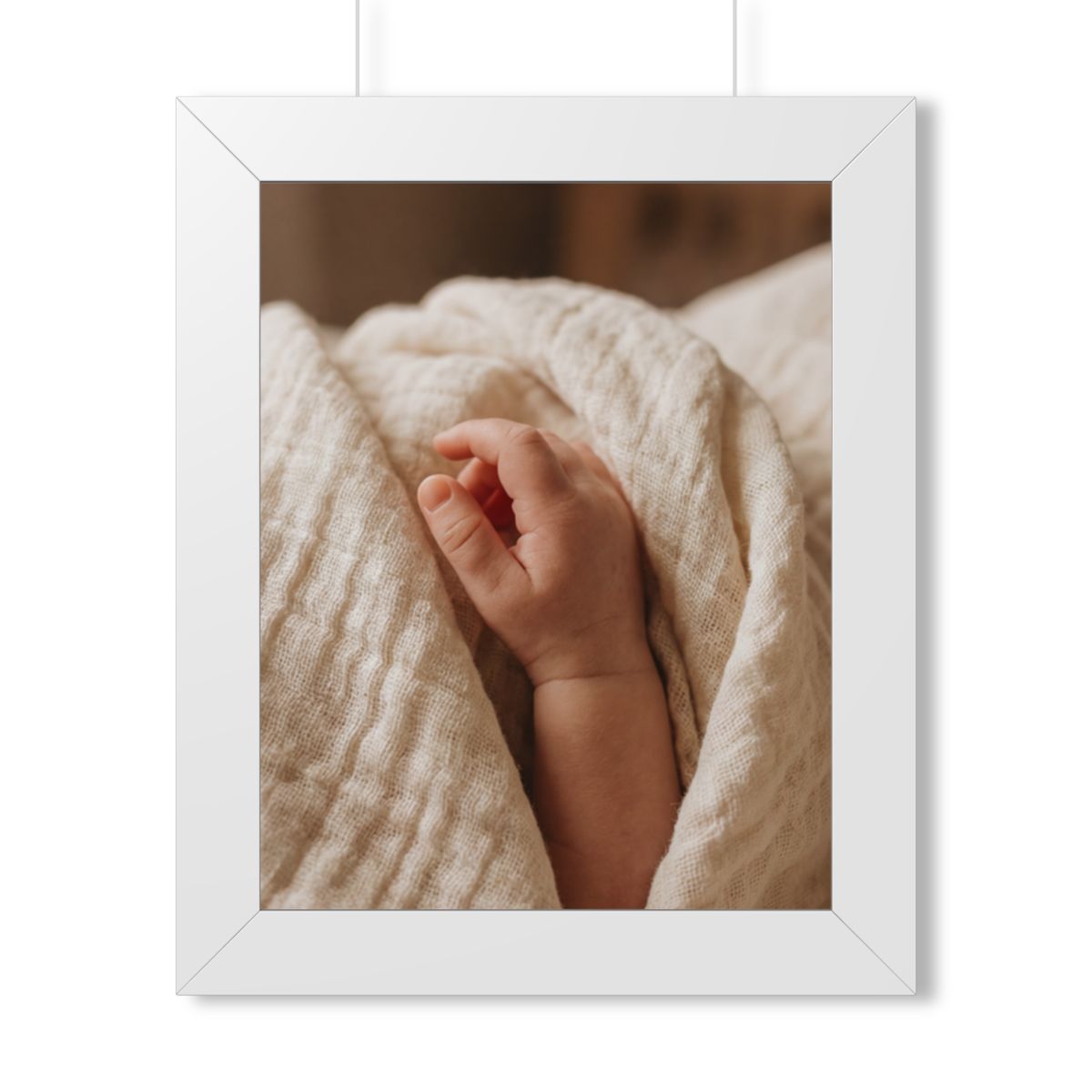 Framed Vertical Poster - Tender Newborn Hand in Soft Muslin...