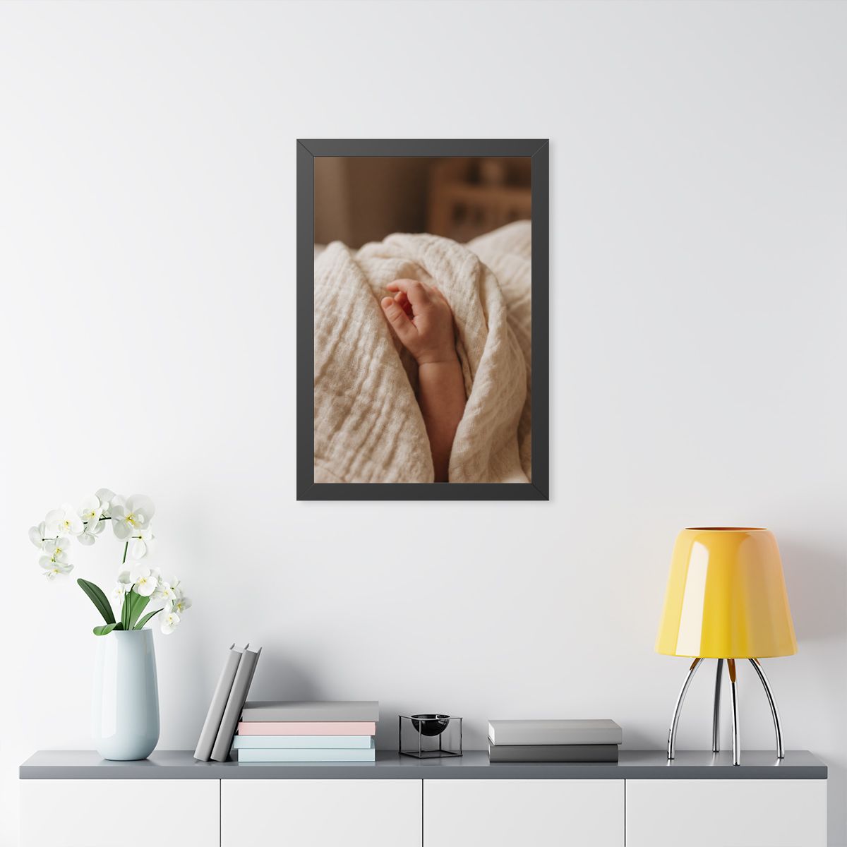 Framed Vertical Poster - Tender Newborn Hand in Soft Muslin...