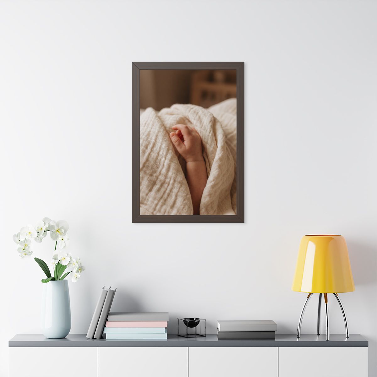 Framed Vertical Poster - Tender Newborn Hand in Soft Muslin...
