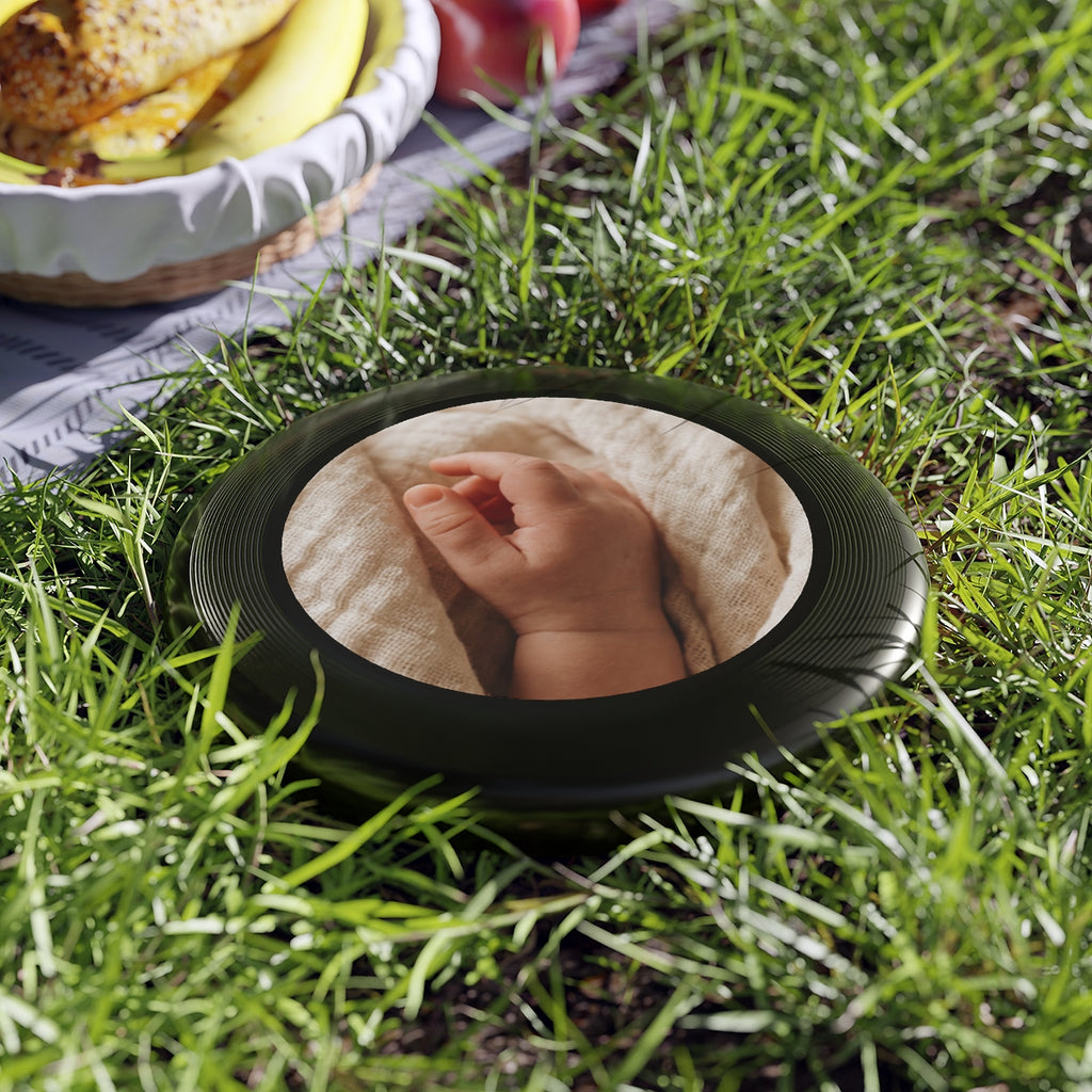 Wham-O Frisbee - Tender Newborn Hand in Soft Muslin Blanket...
