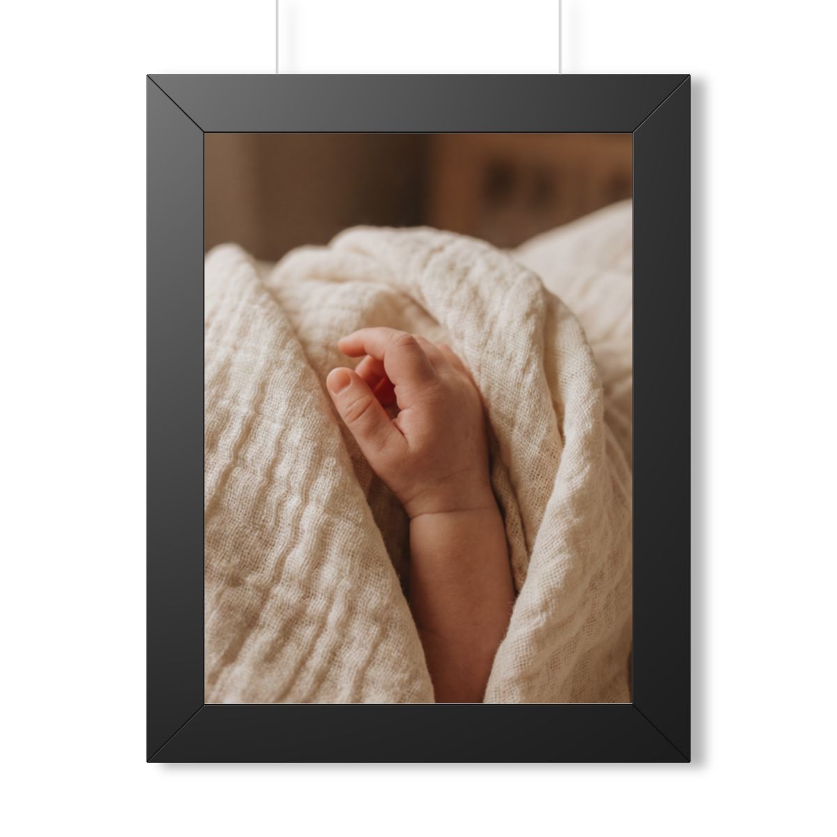 Framed Vertical Poster - Tender Newborn Hand in Soft Muslin...