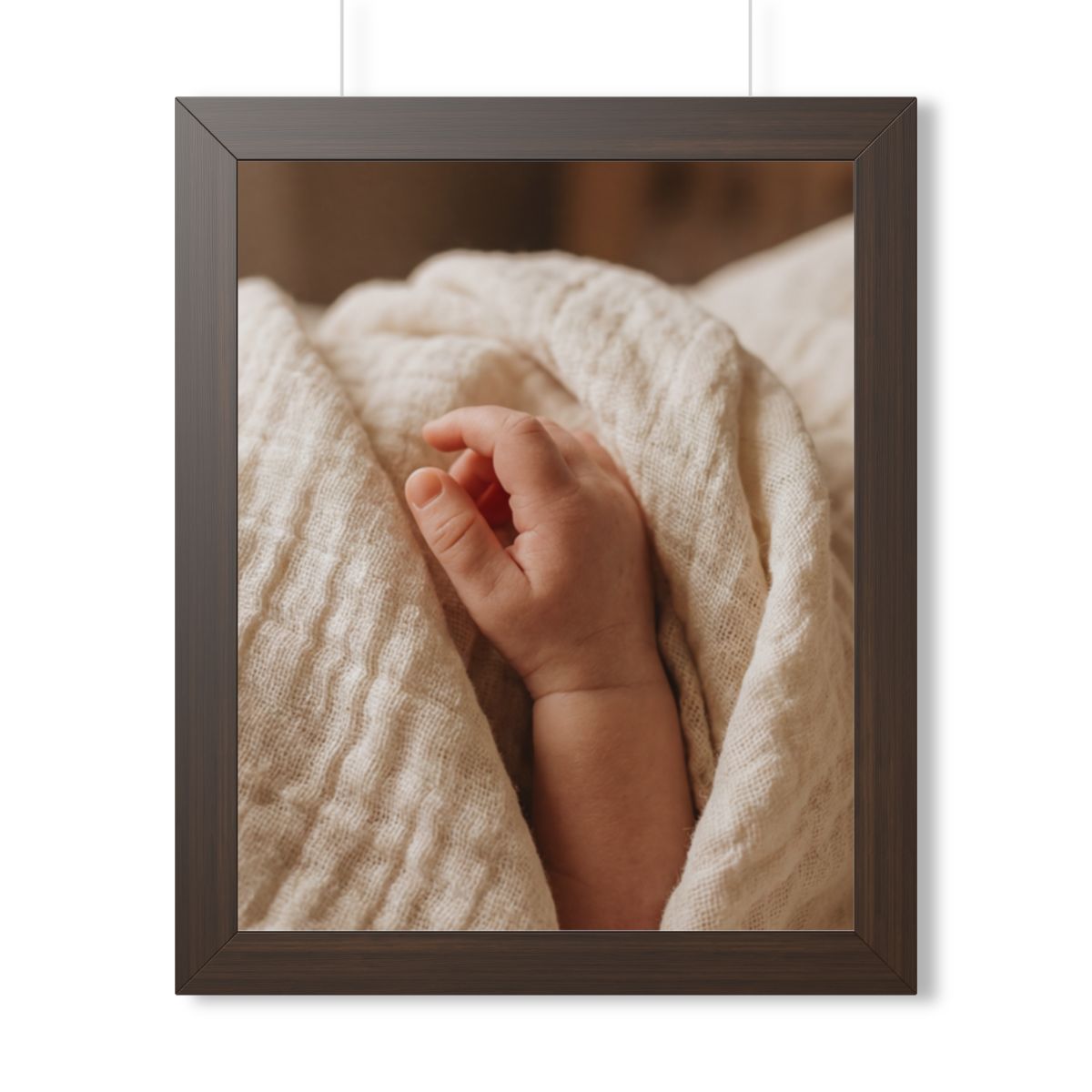 Framed Vertical Poster - Tender Newborn Hand in Soft Muslin...