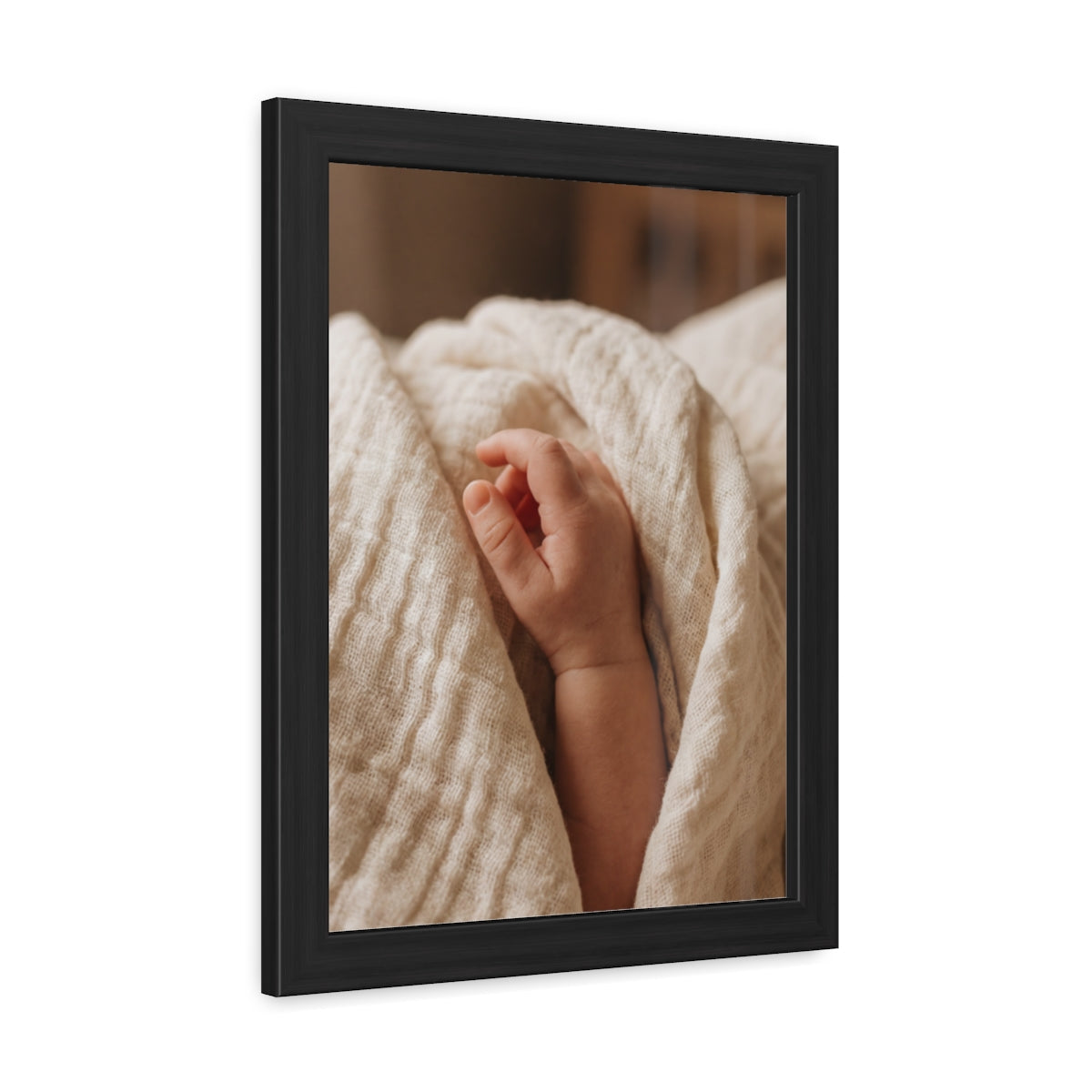 Framed Posters - Tender Newborn Hand in Soft Muslin Blanket...