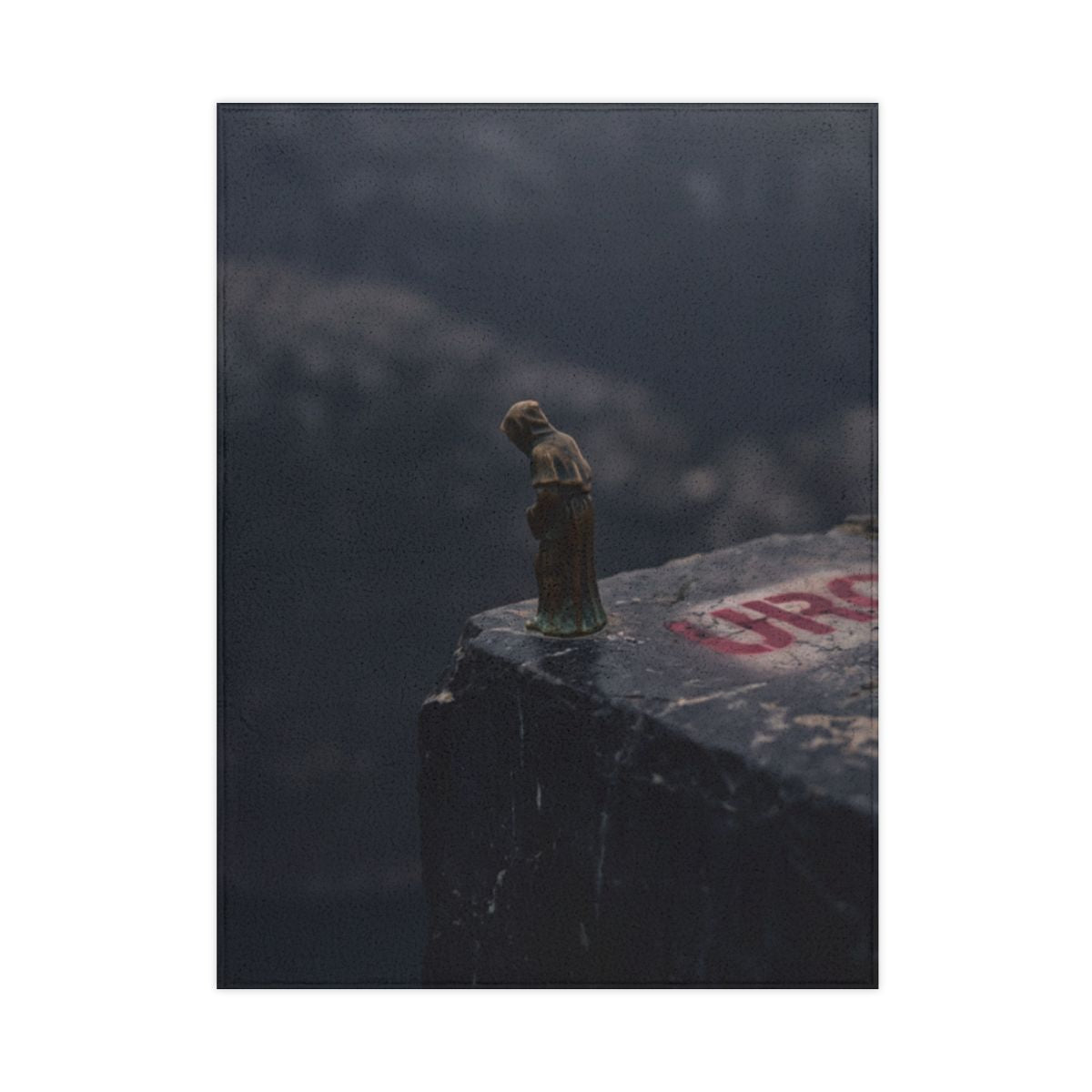 Copertina per bambini con statuetta di bronzo