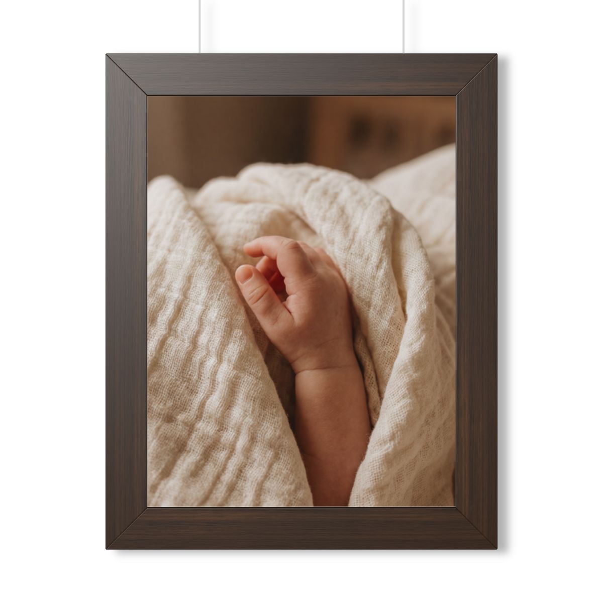 Framed Vertical Poster - Tender Newborn Hand in Soft Muslin...