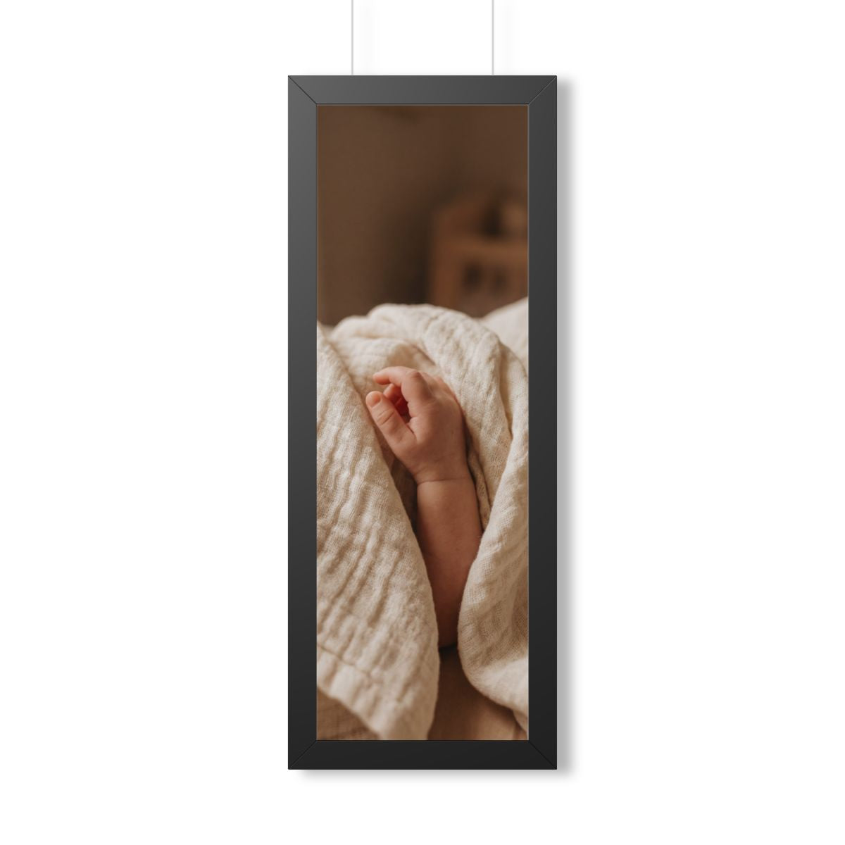 Framed Vertical Poster - Tender Newborn Hand in Soft Muslin...