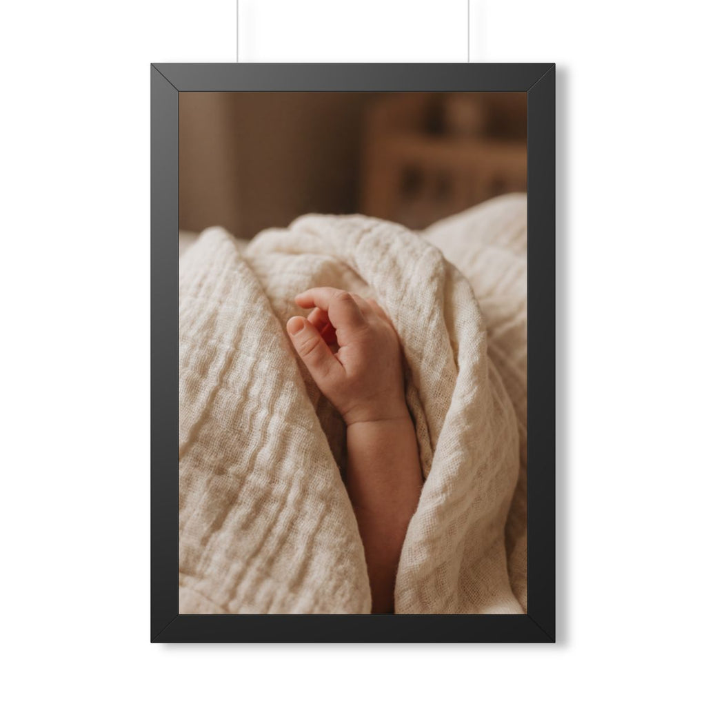 Framed Vertical Poster - Tender Newborn Hand in Soft Muslin...