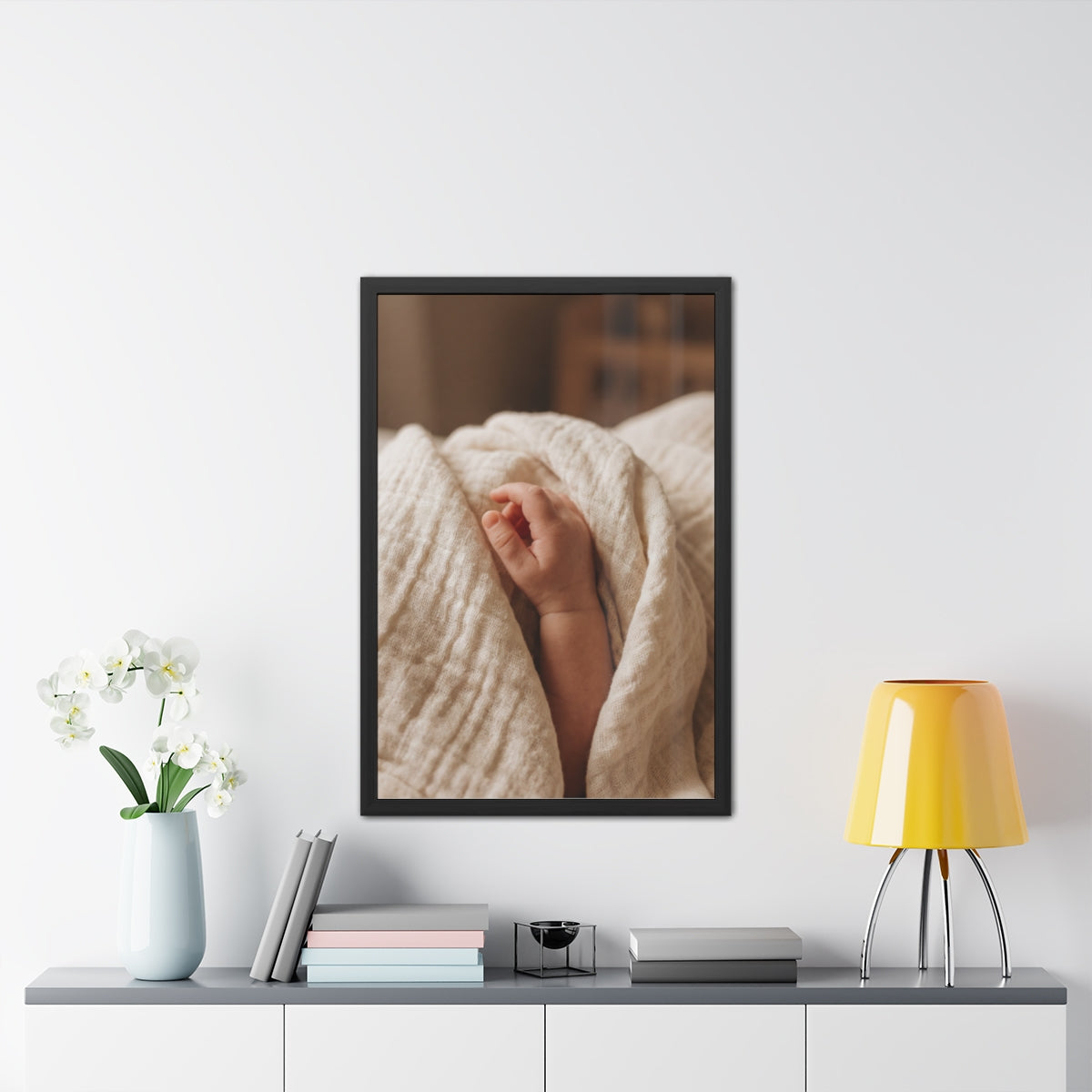 Framed Posters - Tender Newborn Hand in Soft Muslin Blanket...