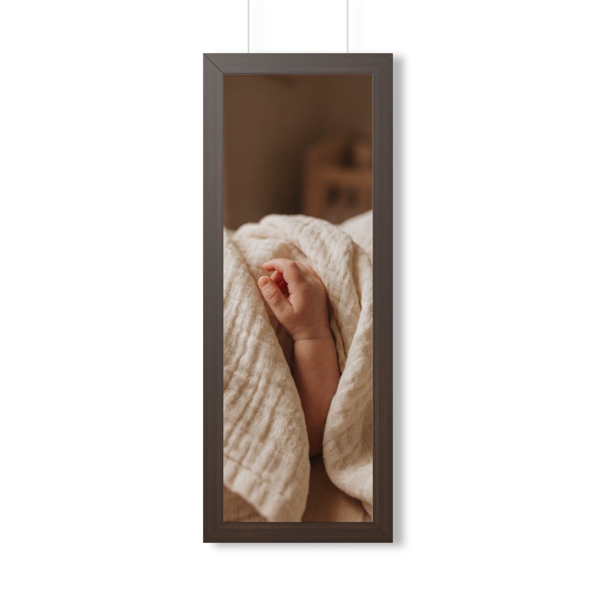 Framed Vertical Poster - Tender Newborn Hand in Soft Muslin...
