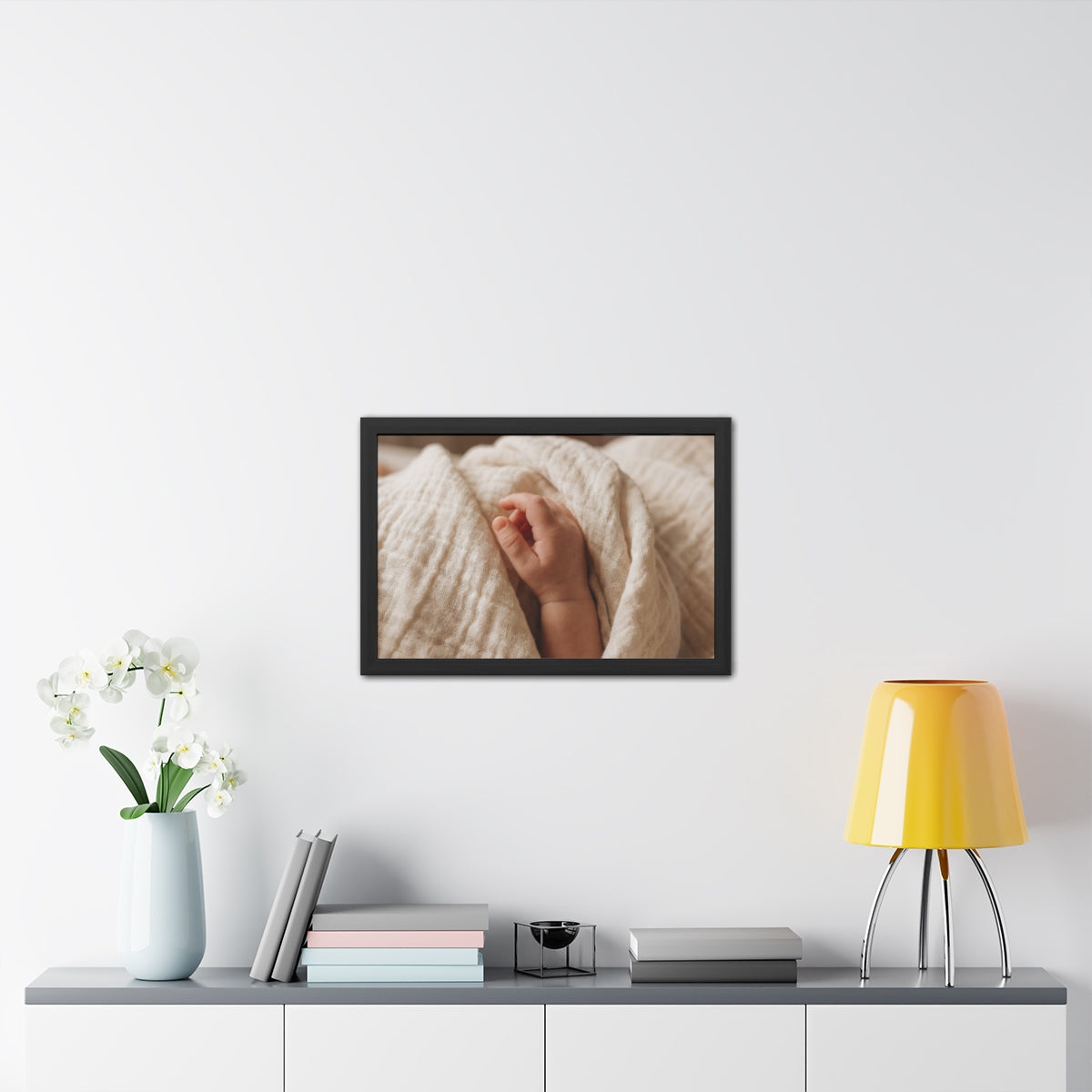 Framed Posters - Tender Newborn Hand in Soft Muslin Blanket...