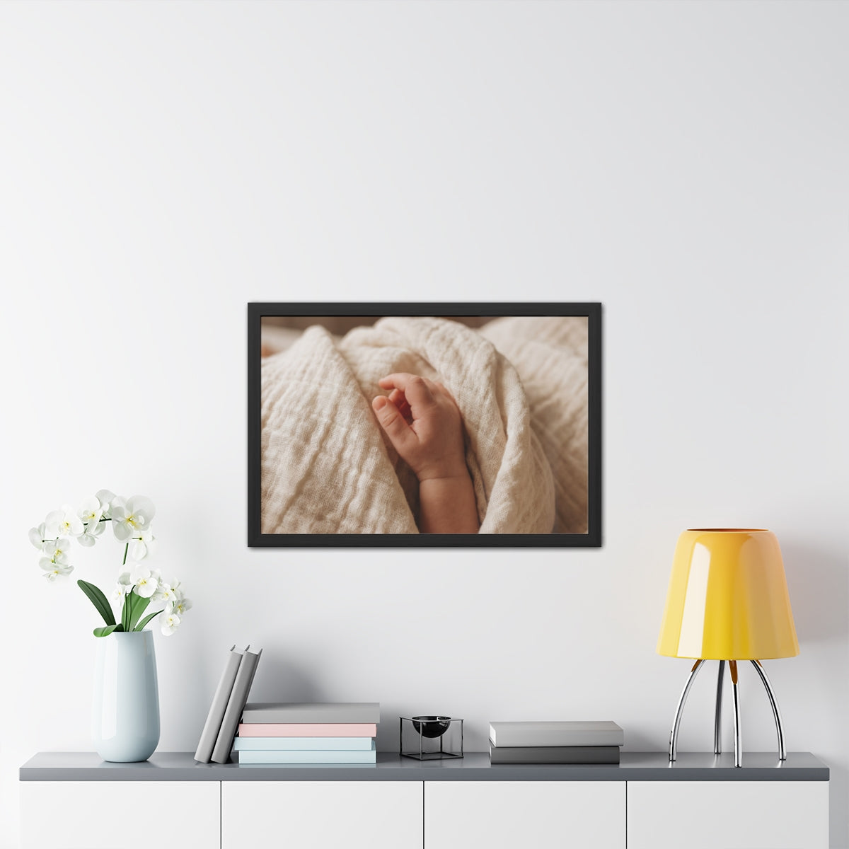 Framed Posters - Tender Newborn Hand in Soft Muslin Blanket...