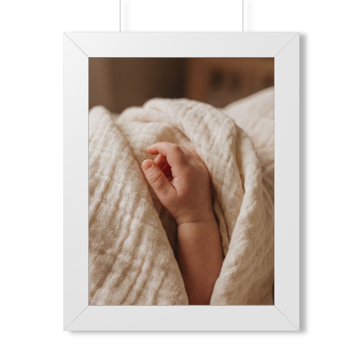 Framed Vertical Poster - Tender Newborn Hand in Soft Muslin...