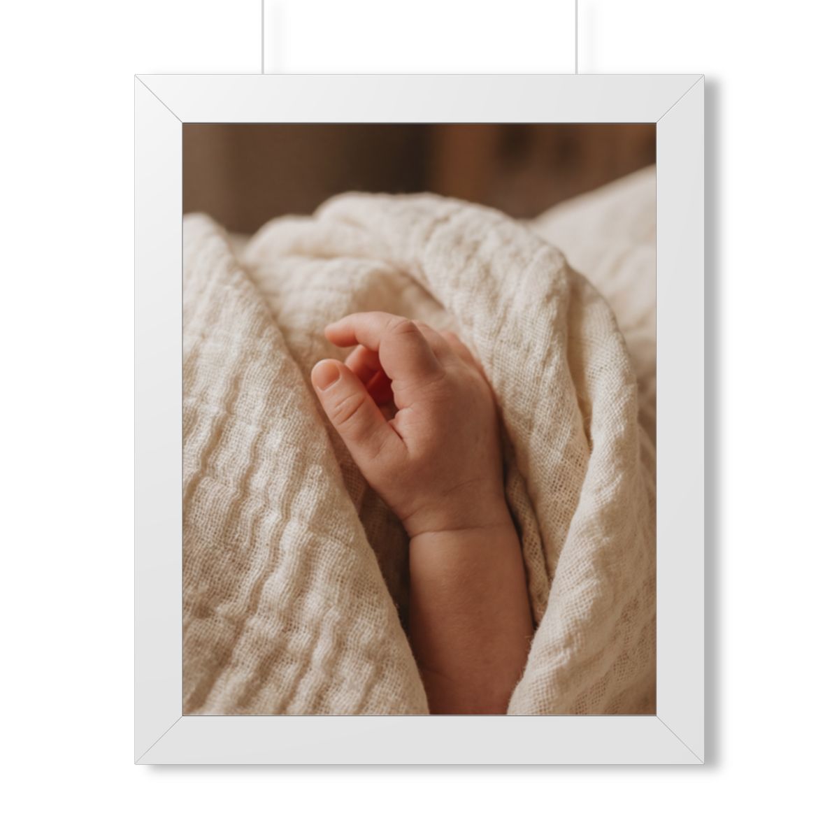 Framed Vertical Poster - Tender Newborn Hand in Soft Muslin...