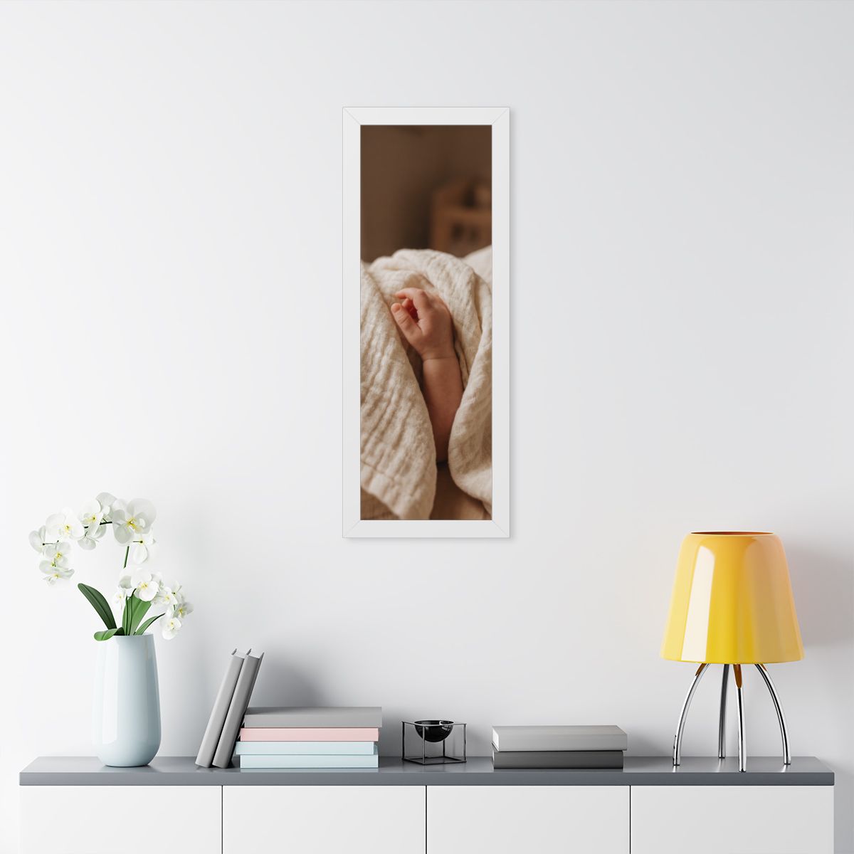 Framed Vertical Poster - Tender Newborn Hand in Soft Muslin...