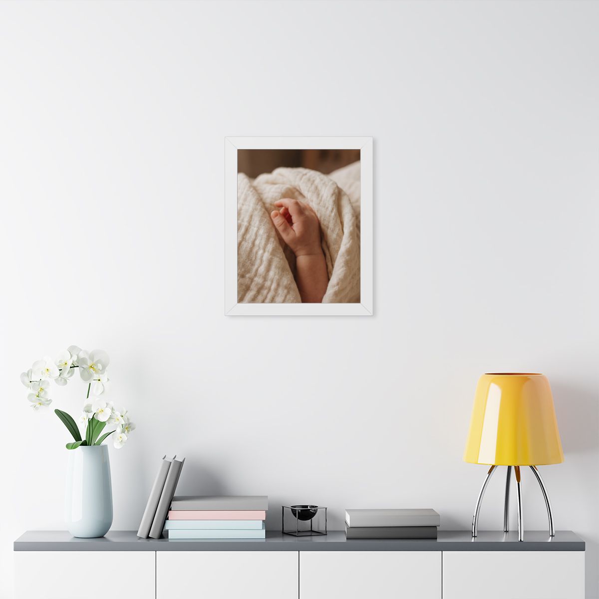 Framed Vertical Poster - Tender Newborn Hand in Soft Muslin...