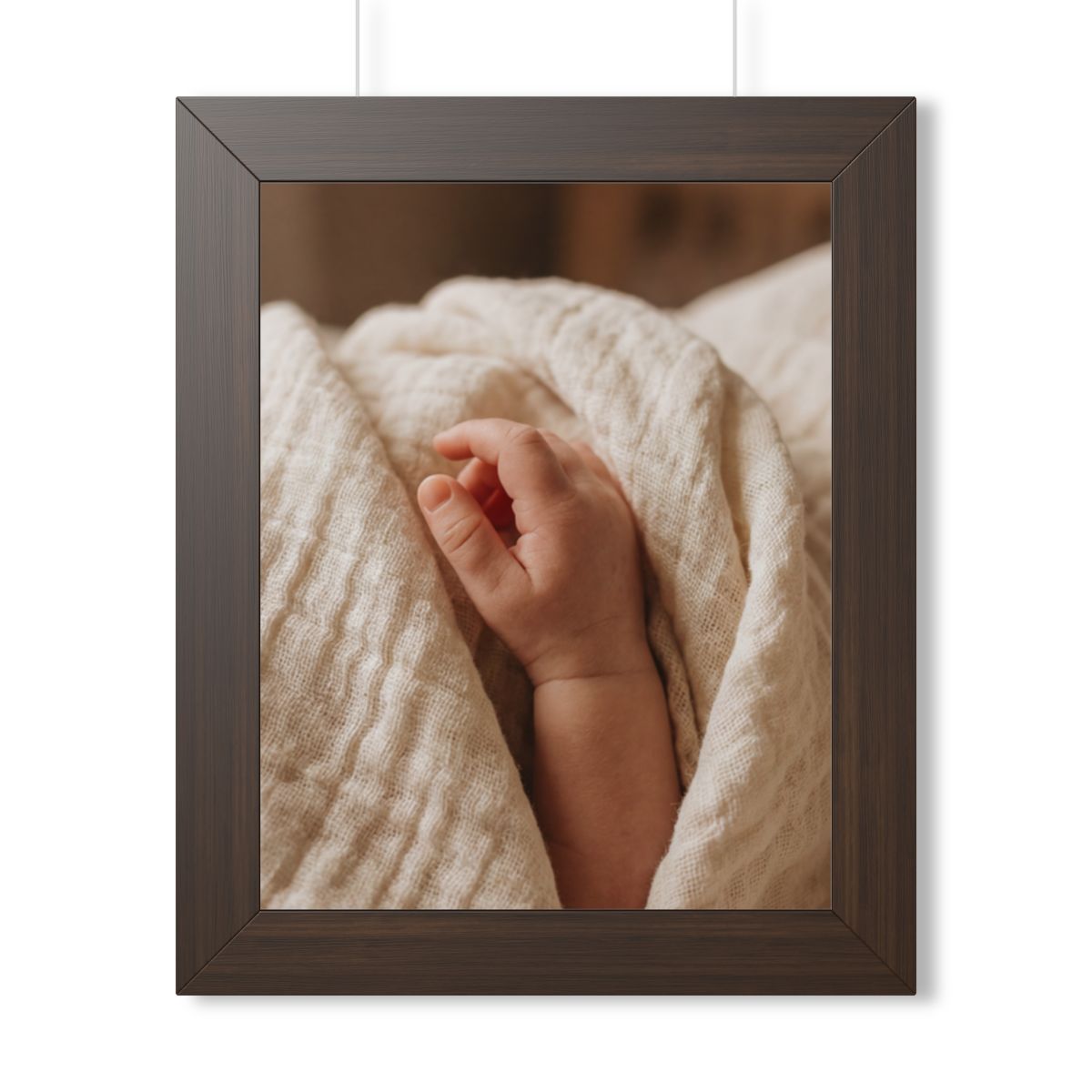 Framed Vertical Poster - Tender Newborn Hand in Soft Muslin...