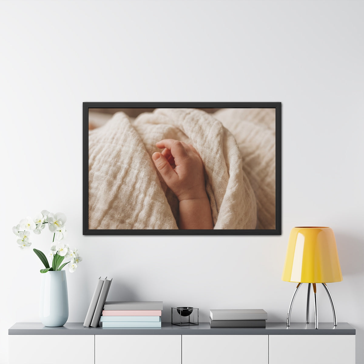 Framed Posters - Tender Newborn Hand in Soft Muslin Blanket...